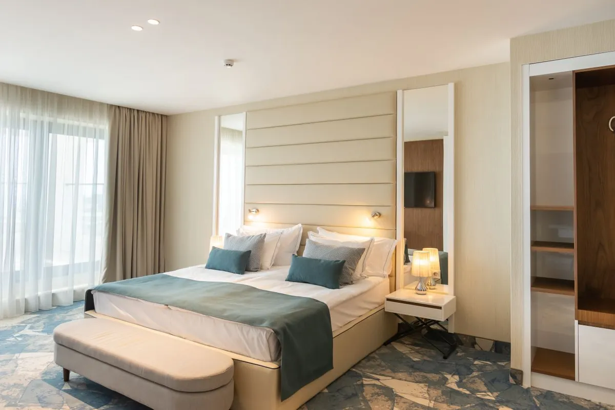 Riu Astoria Junior Suite_bedroom (2).jpeg
